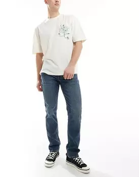 Стильные джинсы из денима узкого кроя Levi's 511 темно-синего цвета