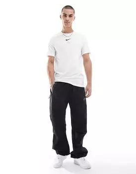 Свободные брюки Tech Woven черного цвета Nike