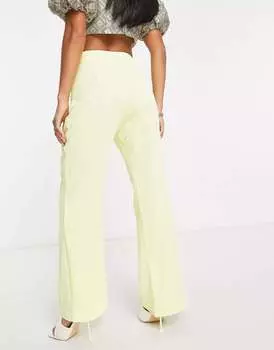 Желтые брюки с расклешенными боками River Island