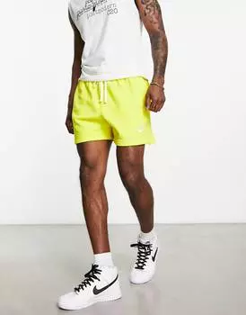 Желтые шорты Nike Club