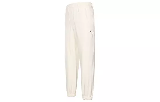 Женские спортивные штаны Therma-FIT One Knit, цвет светло-слоновой кости Nike
