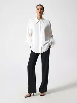 Блуза с перьями на рукавах