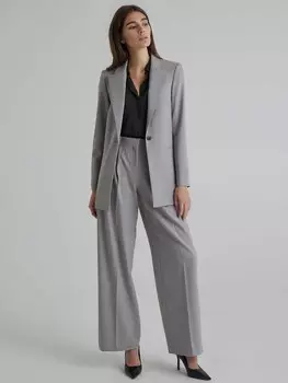 Широкие брюки с защипами