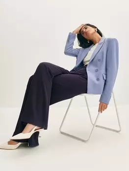 Расклешенные трикотажные брюки XS(42)