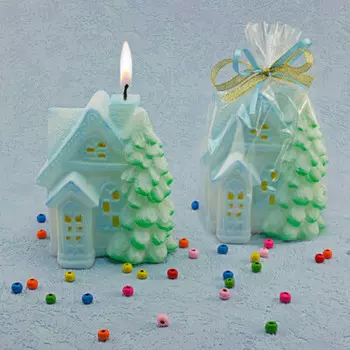 Свеча нг домик в снегу