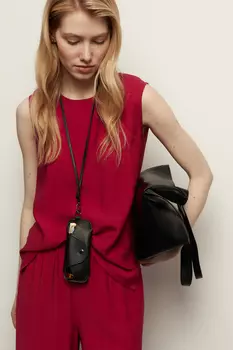 Блузка без рукавов свободного кроя