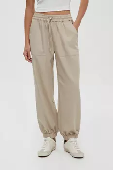 Спортивные брюки зауженного кроя на резинке