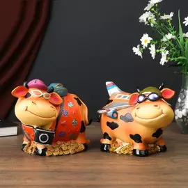 Копилка "Коровка путешественница" 19х13х15 см рыжая с фотоаппаратом