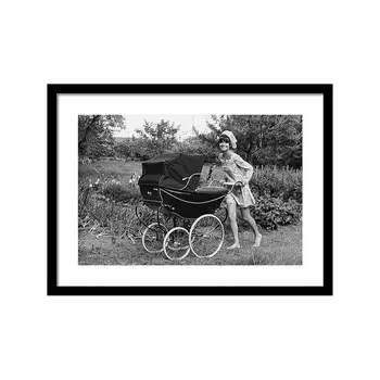Audrey Hepburn Pushing A Pram Постер
