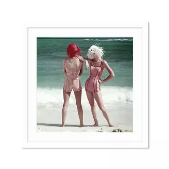 Two Models Standing On A Beach Постер