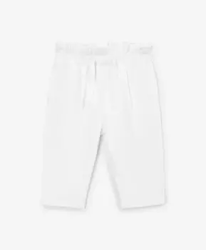 Брюки для девочки из футера зауженные к низу белые Gulliver