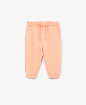 Брюки-джоггеры для девочки из футера коралловые Gulliver