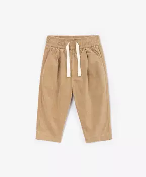 Брюки вельветовые зауженные с поясом на резинке бежевые для девочки Gulliver (68-46)