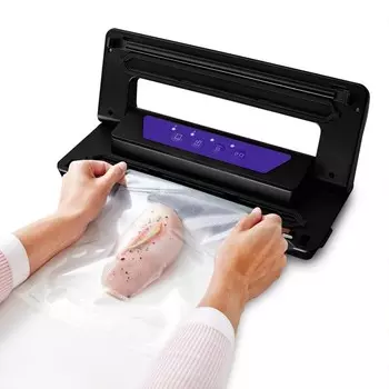 Вакуумный упаковщик Kitfort KT-1528-1 черный/фиолетовый