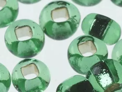 Бисер прозрачный с серебр.центром 10/0 (57100), кв.отв., 50гр Preciosa