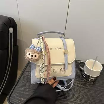 2025 large-capacity bag women s new British style retro buckle design backpack student messenger square bag