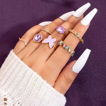 European and American new dripping butterfly imitation gemstone and diamond ring set Geometric twist ring seven-piece set