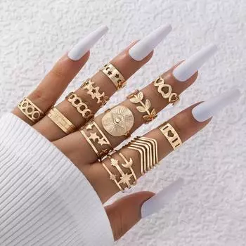 European and American new leaf love ring set geometric hollow moon eye twelve-piece ring set is versatile