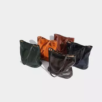 Female senior feeling lazy bucket large capacity 2024 new oil wax leather soft leather niche commuter bag кофейный