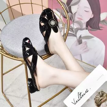 Flat-bottomed slippers for women to wear new baotou hollow octopus sandals cow patent leather low-heeled comfortable slippers 34