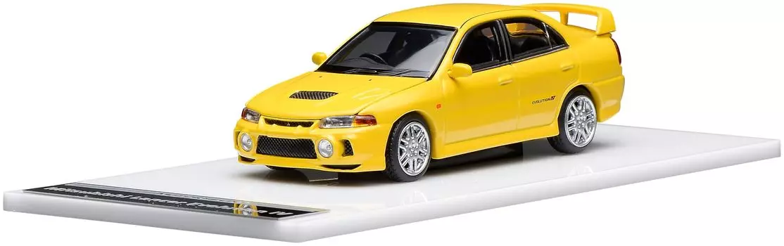 FREESTYLE MOTORHELIX Mitsubishi Lancer Evolution IV Одуванчиково-желтый Готовая модель M64007 1/64