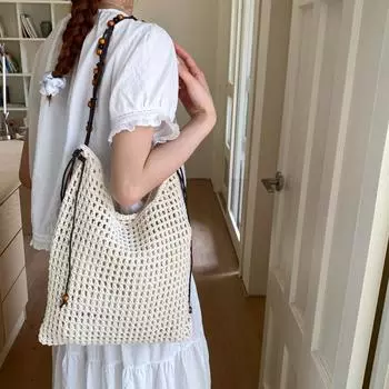 Hollow woven fashionable large-capacity bucket bag women s summer new holiday wind beach straw shoulder bag белый