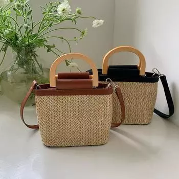Корейская версия Ins Маленькая женская сумка Seaside New Niche Crossbody Bag Knitted Женская ручная плетеная соломенная сумка-ведро