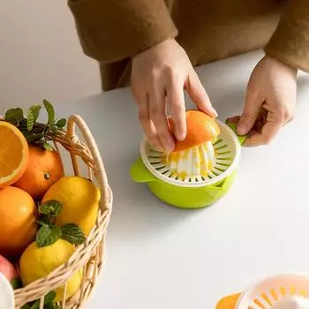 Кухонные принадлежности Ручной пластиковый инструмент для фруктов Соковыжималка для апельсинов и лимонов Портативная соковыжималка для цитрусовых 1PCS зелёный