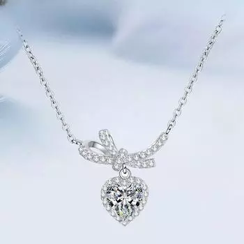 Милое 1CT муассанитовое ожерелье с вырезом в форме сердца для женщин, элегантный бант, настоящая подвеска из стерлингового серебра 925 пробы, подарок, очаровательные оригинальные ювелирные изделия