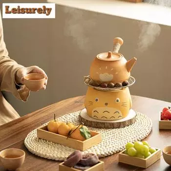 Милый кот, грубая керамика, обжаренный чайник, зимний чай, заваривание на плите, грелка для свечей, банка для чая с молоком, боковая ручка, основание горшка