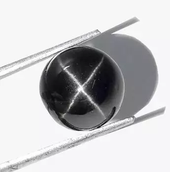 Натуральный кабошон круглой формы Lasonya Black Star россыпью 7,40 карата 11x7 мм