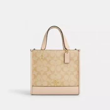 Новогодняя сумка Coach Dempsey Tote 22 с драконом