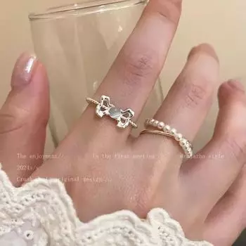 Регулируемое кольцо-бантик с камнем кошачий глаз и жемчугом - элегантный аксессуар для указательного пальца J953 серебряный