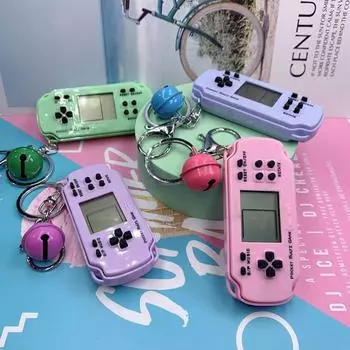 Ретро-игра Электронная игровая консоль Встроенная 26 игр Видеоигра Портативные игровые плееры Игрушки Рождественские детские подарки с брелком фиолетовый