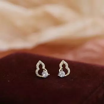 Серьги в форме полой тыквы с бриллиантами для женщин. Новые простые и модные серьги. Элегантные темпераментные и высококачественные серьги.