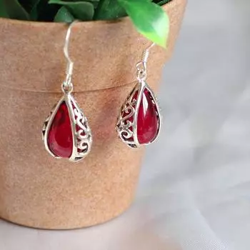 Серебряные модные женские серьги с полым гранатом S925