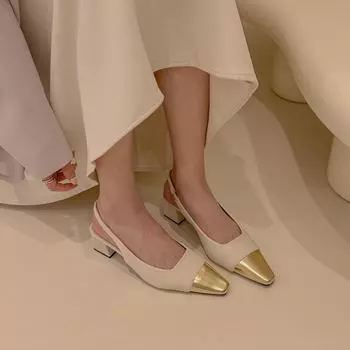 Xiaoxiangfeng splicing baotou sandals women s back space 2025 new spring and summer middle heel thick heel Muller shoes high value single shoes 35