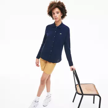 Женское поло Lacoste