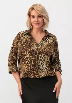 Блуза с патами на рукавах и брошью