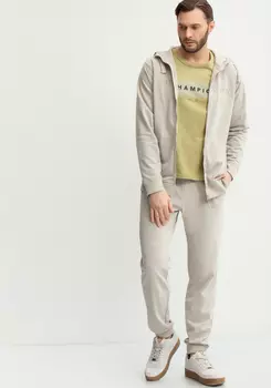 Брюки с карманами и манжетами по низу