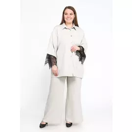 Костюм с отделкой из кружева