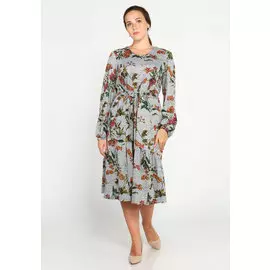 Платье оригинального дизайна с воланом