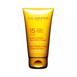 CLARINS Солнцезащитный крем для лица, предупреждающий появление морщин и пигментных пятен UVA/UVB 15