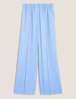 Брюки свободного кроя с широкими штанинами