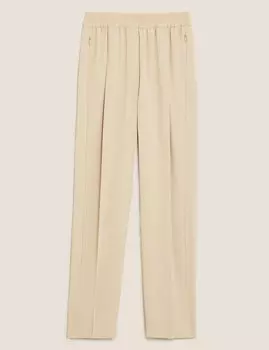 Зауженные брюки до щиколотки с карманами