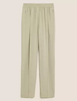 Зауженные брюки до щиколотки с карманами