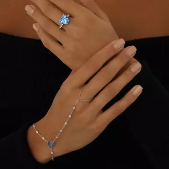 Слейв-браслет с голубым фианитом в форме сердца из серебра MIE