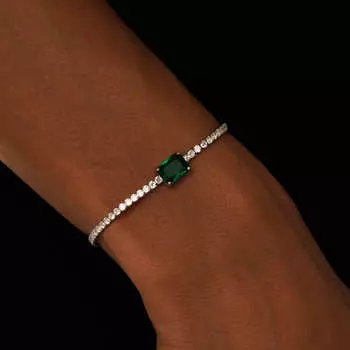 Теннисный серебряный браслет с зеленым фианитом MIE