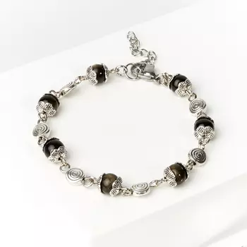 Браслет обсидиан золотистый (биж. сплав, сталь хир.) 6 мм 17 см (+3 см)