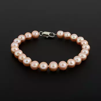 Браслет жемчуг персиковый 7 мм 16 см (биж. сплав)
